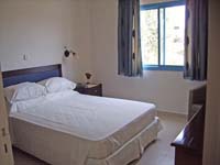 Superior double and 1 child with inland view, balcony, and private facilities (bath and shower)